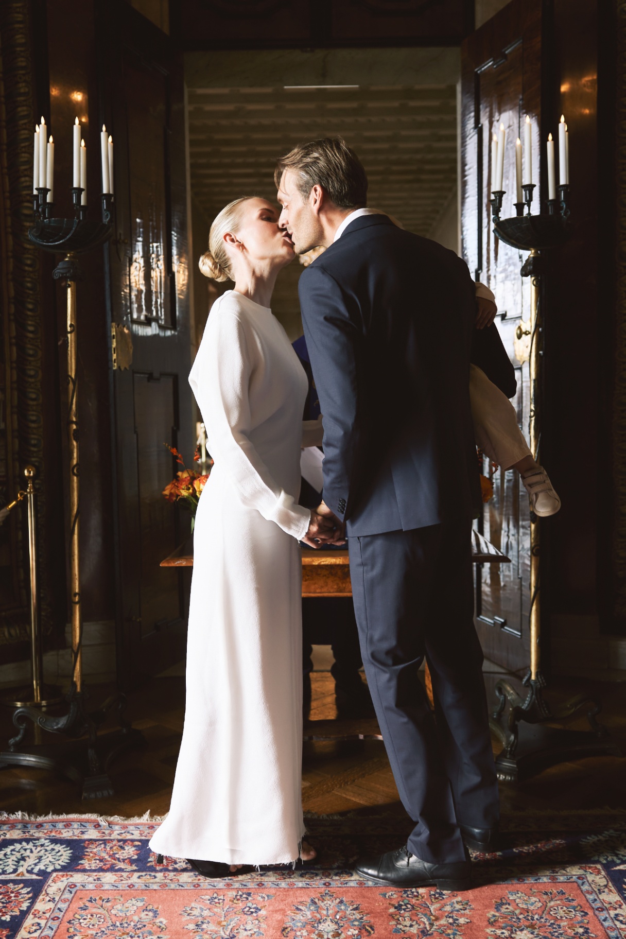 The first kiss between candelabras